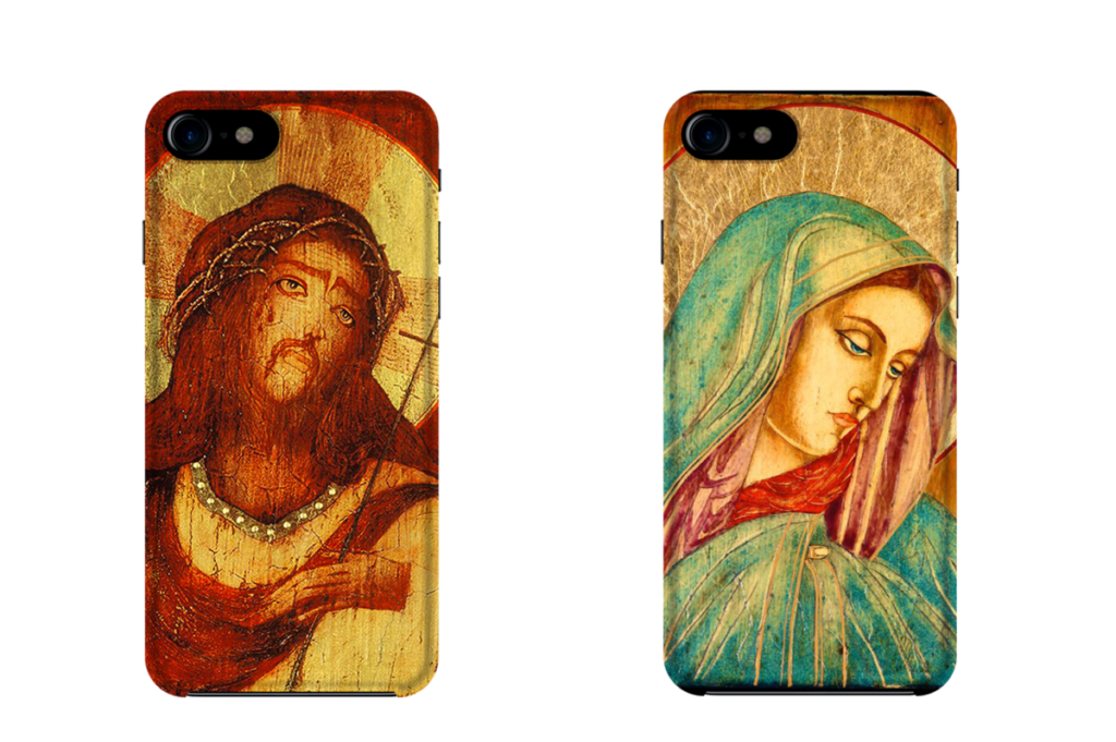 Two cases of jesus and mary painted on wood.